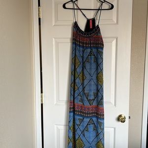 Beautiful maxi dress with bead detailing around the neck